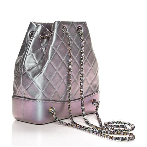 chanel iridescent backpack|Chanel quilted hip bag.